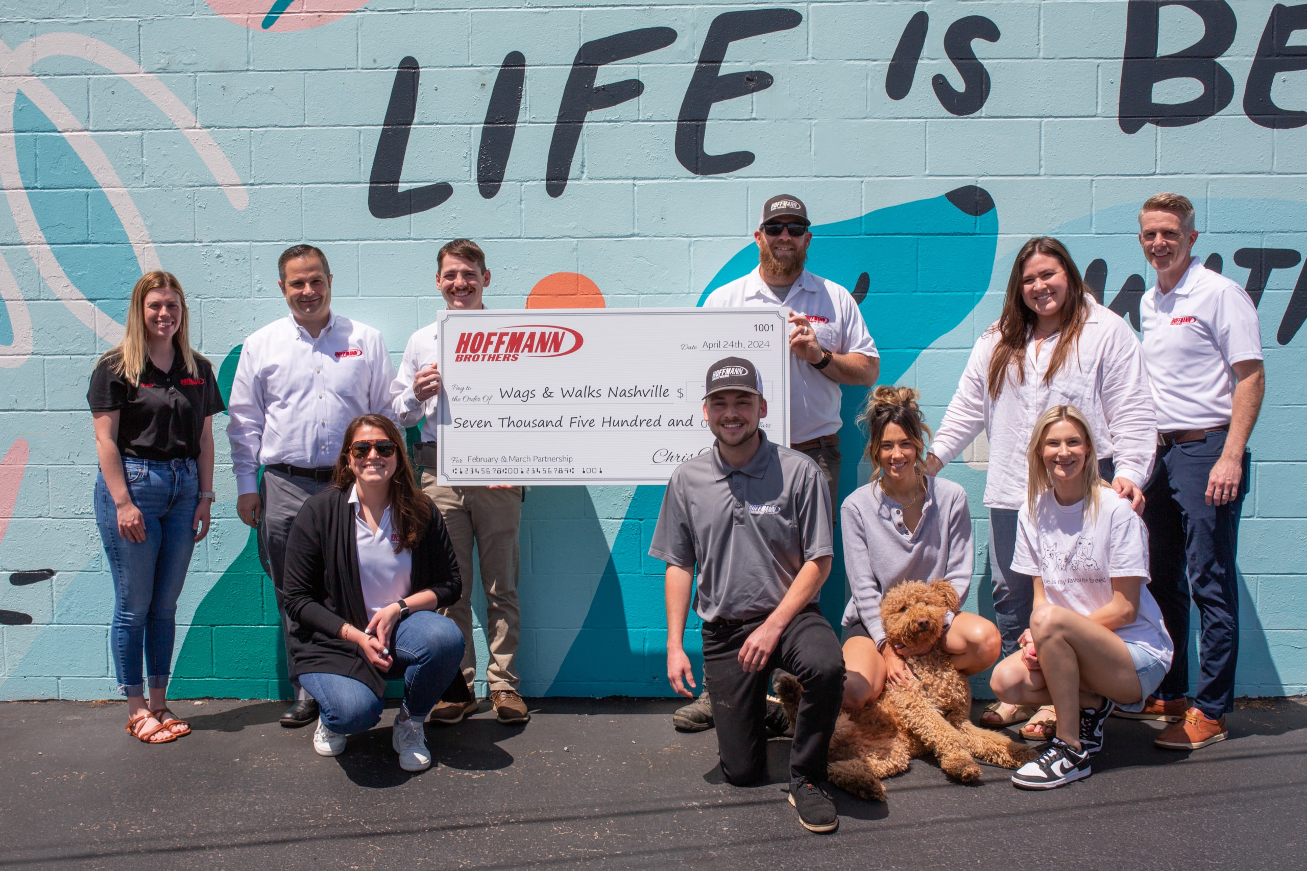 $5000 donation check for Wags and Walks